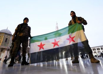 Síria: Rebeldes trabalham para formar governo e restaurar a ordem após a queda de Assad